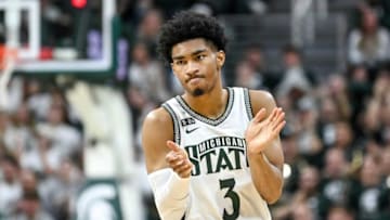 Michigan State's Jaden Akins celebrates after his dunk against Rutgers during the second half on Thursday, Jan. 19, 2023, at the Breslin Center in East Lansing.230119 Msu Rutgers Bball 121a