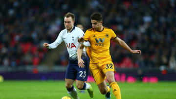 LONDON, ENGLAND - DECEMBER 29: Christian Eriksen of Tottenham Hotspur battles for possession with Leander Dendoncker of Wolverhampton Wanderers during the Premier League match between Tottenham Hotspur and Wolverhampton Wanderers at Tottenham Hotspur Stadium on December 29, 2018 in London, United Kingdom. (Photo by Jordan Mansfield/Getty Images)