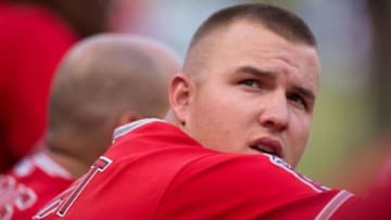 Jul 11, 2014; Arlington, TX, USA; Los Angeles Angels center fielder Mike Trout (27) during the game against the Texas Rangers at Globe Life Park in Arlington. Trout hit a home run in the fourth inning. The Angels shut out the Rangers 3-0. Mandatory Credit: Jerome Miron-USA TODAY Sports