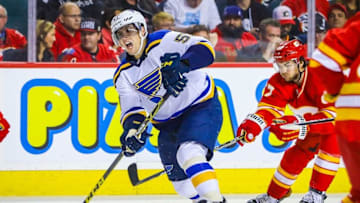 Oct 22, 2016; Calgary, Alberta, CAN; St. Louis Blues left wing David Perron (57) shoot the puck against Calgary Flames during the third period at Scotiabank Saddledome. St. Louis Blues won 6-4. Mandatory Credit: Sergei Belski-USA TODAY Sports