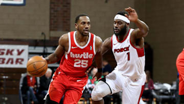 SIOUX FALLS, SD - DECEMBER 25: Marquis Teague #25 of the Memphis Hustle drives past Ike Nwamu #1 of the Sioux Falls Skyforce during an NBA G-League game on December 25, 2017 at the Sanford Pentagon in Sioux Falls, South Dakota. NOTE TO USER: User expressly acknowledges and agrees that, by downloading and or using this photograph, User is consenting to the terms and conditions of the Getty Images License Agreement. Mandatory Copyright Notice: Copyright 2017 NBAE (Photo by Dave Eggen/NBAE via Getty Images)