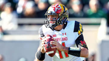 Nov 14, 2015; East Lansing, MI, USA; Maryland Terrapins quarterback Perry Hills (11) prepares to throw the ball against the Michigan State Spartans during the first half at Spartan Stadium. Mandatory Credit: Mike Carter-USA TODAY Sports
