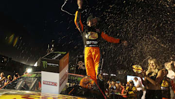 LAS VEGAS, NEVADA - SEPTEMBER 15: Martin Truex Jr., driver of the #19 Bass Pro Shops Toyota, celebrates in victory lane after winning the Monster Energy NASCAR Cup Series South Point 400 at Las Vegas Motor Speedway on September 15, 2019 in Las Vegas, Nevada. (Photo by Chris Graythen/Getty Images)