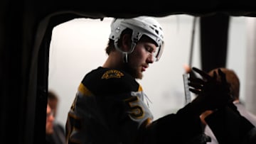 ST. LOUIS, MISSOURI - JUNE 09: Brandon Carlo #25 of the Boston Bruins makes his way to the ice before Game Six of the 2019 NHL Stanley Cup Final between the Boston Bruins and the St. Louis Blues at Enterprise Center on June 09, 2019 in St Louis, Missouri. (Photo by Brian Babineau/NHLI via Getty Images)