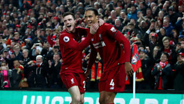 LIVERPOOL, ENGLAND - FEBRUARY 27: Virgil van Dijk of Liverpool celebrates after scoring his team's fifth goal with Andy Robertson of Liverpool during the Premier League match between Liverpool FC and Watford FC at Anfield on February 27, 2019 in Liverpool, United Kingdom. (Photo by Clive Brunskill/Getty Images)