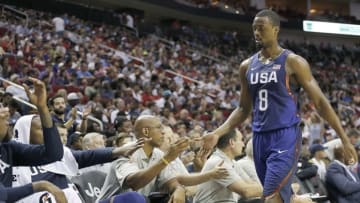 Aug 1, 2016; Houston, TX, USA; United States forward Harrison Barnes (8) low fives his teammates and coaches after coming out of the game against Nigeria in the second quarter during an exhibition basketball game at Toyota Center. United States won 110 to 66. Mandatory Credit: Thomas B. Shea-USA TODAY Sports