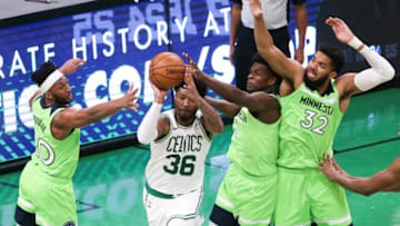 The Minnesota Timberwolves are making major adjustments in an effort to improve their defense this year. (Photo by Kathryn Riley/Getty Images)