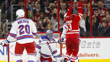 Mar 31, 2016; Raleigh, NC, USA; Carolina Hurricanes forward Jeff Skinner (53) celebrates after scoring a goal past New York Rangers goalie Henrik Lundqvist (30) at PNC Arena. The Hurricanes won 4-3. Mandatory Credit: James Guillory-USA TODAY Sports