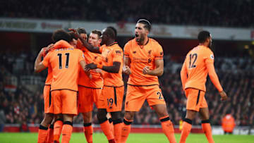 LONDON, ENGLAND - DECEMBER 22: Emre Can of Liverpool (23) celebrates Mohamed Salah of Liverpool scores their second goal during the Premier League match between Arsenal and Liverpool at Emirates Stadium on December 22, 2017 in London, England. (Photo by Julian Finney/Getty Images)