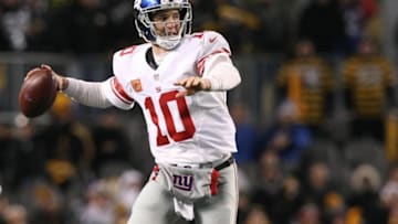 Dec 4, 2016; Pittsburgh, PA, USA; New York Giants quarterback Eli Manning (10) throws a pass against the Pittsburgh Steelers during the second half at Heinz Field. The Steelers won the game, 24-14. Mandatory Credit: Jason Bridge-USA TODAY Sports
