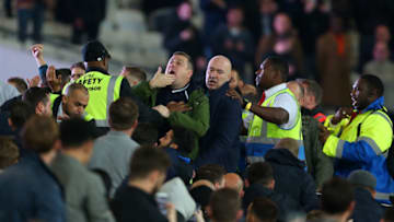 LONDON, ENGLAND - OCTOBER 26: Fans are pushed back by stewards as they taunt each other during the EFL Cup fourth round match between West Ham and Chelsea at The London Stadium on October 26, 2016 in London, England. (Photo by Catherine Ivill - AMA/Getty Images)