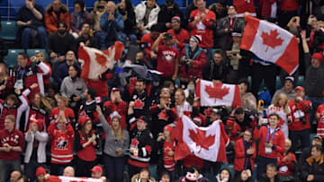 Canada fans cheer on their team in the women's gold medal ice hockey match between the US and Canada during the Pyeongchang 2018 Winter Olympic Games at the Gangneung Hockey Centre in Gangneung on February 22, 2018. / AFP PHOTO / Ed JONES (Photo credit should read ED JONES/AFP via Getty Images)