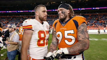 Kansas City Chiefs tight end Travis Kelce and Denver Broncos defensive end Derek Wolfe after game. USA Today.