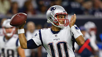 HOUSTON, TX - AUGUST 19: Jimmy Garoppolo #10 of the New England Patriots looks for a receiver in the third quarter against the Houston Texans at NRG Stadium on August 19, 2017 in Houston, Texas. (Photo by Bob Levey/Getty Images)