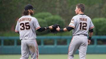 Jun 6, 2015; Philadelphia, PA, USA; San Francisco Giants shortstop Brandon Crawford (35) and San Francisco Giants second baseman Joe Panik (12) in a game against the Philadelphia Phillies at Citizens Bank Park. The Giants won 7-5. Mandatory Credit: Bill Streicher-USA TODAY Sports
