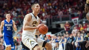 Dec 19, 2015; Des Moines, IA, USA; Iowa Hawkeyes forward Jarrod Uthoff (20) looks to shoot the ball during the second half against the Drake Bulldogs at Wells Fargo Arena. Iowa won 70-64. Mandatory Credit: Jeffrey Becker-USA TODAY Sports