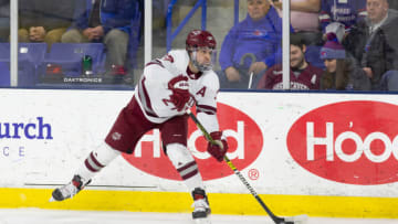 LOWELL, MA - FEBRUARY 21: Jake McLaughlin #27 of the Massachusetts Minutemen skates against the Massachusetts Lowell River Hawks during NCAA men's hockey at the Tsongas Center on February 21, 2020 in Lowell, Massachusetts. The River Hawks won 3-2. (Photo by Richard T Gagnon/Getty Images)