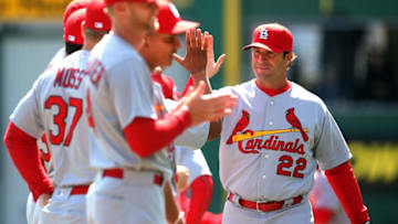 Apr 3, 2016; Pittsburgh, PA, USA; St. Louis Cardinals manager Mike Matheny (22) high-fives his team during player introductions before playing the Pittsburgh Pirates at PNC Park. Mandatory Credit: Charles LeClaire-USA TODAY Sports