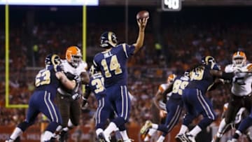 Aug 23, 2014; Cleveland, OH, USA; St. Louis Rams quarterback Shaun Hill (14) passes the ball against the Cleveland Browns in the second quarter at FirstEnergy Stadium. Mandatory Credit: Rick Osentoski-USA TODAY Sports