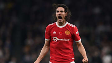Manchester United's Uruguayan striker Edinson Cavani celebrates after scoring their second goal during the English Premier League football match between Tottenham Hotspur and Manchester United at Tottenham Hotspur Stadium in London, on October 30, 2021. - - RESTRICTED TO EDITORIAL USE. No use with unauthorized audio, video, data, fixture lists, club/league logos or 'live' services. Online in-match use limited to 120 images. An additional 40 images may be used in extra time. No video emulation. Social media in-match use limited to 120 images. An additional 40 images may be used in extra time. No use in betting publications, games or single club/league/player publications. (Photo by Glyn KIRK / AFP) / RESTRICTED TO EDITORIAL USE. No use with unauthorized audio, video, data, fixture lists, club/league logos or 'live' services. Online in-match use limited to 120 images. An additional 40 images may be used in extra time. No video emulation. Social media in-match use limited to 120 images. An additional 40 images may be used in extra time. No use in betting publications, games or single club/league/player publications. / RESTRICTED TO EDITORIAL USE. No use with unauthorized audio, video, data, fixture lists, club/league logos or 'live' services. Online in-match use limited to 120 images. An additional 40 images may be used in extra time. No video emulation. Social media in-match use limited to 120 images. An additional 40 images may be used in extra time. No use in betting publications, games or single club/league/player publications. (Photo by GLYN KIRK/AFP via Getty Images)