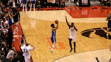 TORONTO, CANADA - JUNE 2: Quinn Cook #4 of the Golden State Warriors shoots three point basket against the Toronto Raptors during Game Two of the NBA Finals on June 2, 2019 at Scotiabank Arena in Toronto, Ontario, Canada. NOTE TO USER: User expressly acknowledges and agrees that, by downloading and/or using this photograph, user is consenting to the terms and conditions of the Getty Images License Agreement. Mandatory Copyright Notice: Copyright 2019 NBAE (Photo by Carlos Osorio/NBAE via Getty Images)