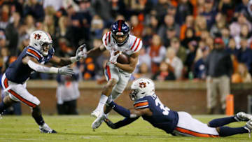Auburn footballNov 2, 2019; Auburn, AL, USA; Mississippi Rebels running back Jerrion Ealy (9) gets past Auburn Tigers defensive back Jamien Sherwood (9) and linebacker Zakoby McClain (35) during the second quarter at Jordan-Hare Stadium. Mandatory Credit: John Reed-USA TODAY Sports