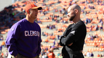 CLEMSON, SOUTH CAROLINA - NOVEMBER 02: (L-R) Head coach Dabo Swinney of the Clemson Tigers talks to head coach Josh Conklin of the Wofford Terriers before their game at Memorial Stadium on November 02, 2019 in Clemson, South Carolina. (Photo by Streeter Lecka/Getty Images)