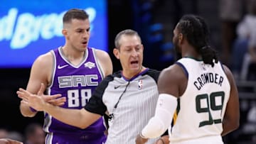 SACRAMENTO, CA - OCTOBER 17: Official JT Orr separates Nemanja Bjelica #88 of the Sacramento Kings and Jae Crowder #99 of the Utah Jazz at Golden 1 Center on October 17, 2018 in Sacramento, California. NOTE TO USER: User expressly acknowledges and agrees that, by downloading and or using this photograph, User is consenting to the terms and conditions of the Getty Images License Agreement. (Photo by Ezra Shaw/Getty Images)