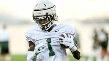 Michigan State's Ronald Williams runs with the ball after a catch during the Meet the Spartans open practice on Monday, Aug. 23, 2021, at Spartan Stadium in East Lansing.210823 Meet The Spartans Football 114a