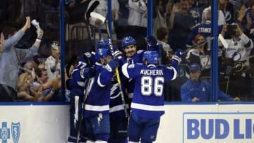 May 8, 2016; Tampa, FL, USA; Tampa Bay Lightning defenseman Victor Hedman (77) is congratulated by right wing Nikita Kucherov (86) and teammates after scored a goal against the New York Islanders during the second period in game five of the second round of the 2016 Stanley Cup Playoffs at Amalie Arena. Mandatory Credit: Kim Klement-USA TODAY Sports