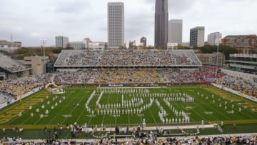 ATLANTA - NOVEMBER 20: The Georgia Tech Yellow Jackets Marching Band spells 'GT' during an intermission in the game against the University of Virginia Cavaliers at Bobby Dodd Stadium on November 20, 2004 in Atlanta, Georgia. The Cavaliers defeated the Yellow Jackets 30-10. (Photo by Doug Pensinger/Getty Images)