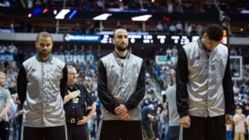 Mar 24, 2015; Dallas, TX, USA; San Antonio Spurs guard Tony Parker (9) and guard Manu Ginobili (20) and forward Tim Duncan (21) prepare to face the Dallas Mavericks at the American Airlines Center. The Mavericks defeated the Spurs 101-94. Mandatory Credit: Jerome Miron-USA TODAY Sports