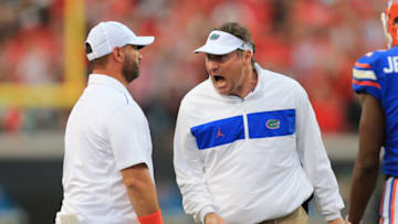 Nov 2, 2019; Jacksonville, FL, USA; Florida Gators head coach Dan Mullen yells at wide receiver coach Billy Gonzalez against the Georgia Bulldogs at TIAA Bank Field. Mandatory Credit: Matt Stamey-USA TODAY Sports