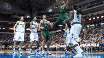 Dec 7, 2014; Dallas, TX, USA; Milwaukee Bucks guard Giannis Antetokounmpo (34) dunks the ball during the second half against the Dallas Mavericks at the American Airlines Center. The Mavericks defeated the Bucks 125-102. Mandatory Credit: Jerome Miron-USA TODAY Sports