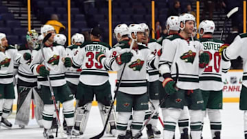 Dec 15, 2016; Nashville, TN, USA; Minnesota Wild players celebrate after a win against the Nashville Predators at Bridgestone Arena. The Wild won 5-2. Mandatory Credit: Christopher Hanewinckel-USA TODAY Sports