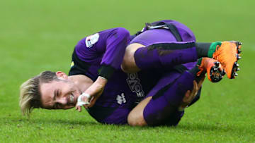 HULL, ENGLAND - MARCH 10: James Maddison of Norwich City grimaces in pain during the Sky Bet Championship match between Hull City and Norwich City at KCOM Stadium on March 10, 2018 in Hull, England. (Photo by Ashley Allen/Getty Images)