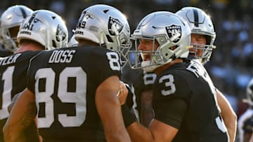 OAKLAND, CALIFORNIA - AUGUST 10: Nathan Peterman #3 of the Oakland Raiders celebrates a touchdown with Keelan Doss #89 during their NFL preseason game against the Los Angeles Rams at RingCentral Coliseum on August 10, 2019 in Oakland, California. (Photo by Robert Reiners/Getty Images)