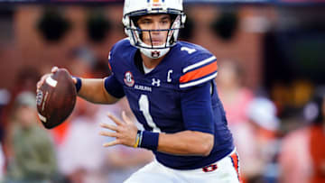 Auburn footballOct 28, 2023; Auburn, Alabama, USA; Auburn Tigers quarterback Payton Thorne (1) rolls out to pass against the Mississippi State Bulldogs during the fourth quarter at Jordan-Hare Stadium. Mandatory Credit: John David Mercer-USA TODAY Sports