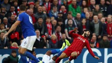 LIVERPOOL, ENGLAND - OCTOBER 05: Hamza Choudhury of Leicester City collides with Mohamed Salah of Liverpool during the Premier League match between Liverpool FC and Leicester City at Anfield on October 05, 2019 in Liverpool, United Kingdom. (Photo by Clive Brunskill/Getty Images)