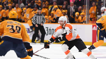 Jan 1, 2019; Nashville, TN, USA; Philadelphia Flyers center Claude Giroux (28) skates with the puck during the second period against the Nashville Predators at Bridgestone Arena. Mandatory Credit: Christopher Hanewinckel-USA TODAY Sports