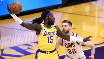 LOS ANGELES, CALIFORNIA - MARCH 26: Montrezl Harrell #15 of the Los Angeles Lakers controls the ball as Dean Wade #32 of the Cleveland Cavaliers defends during the first half of a game against the Los Angeles Lakers at Staples Center on March 26, 2021 in Los Angeles, California. User expressly acknowledges and agrees that, by downloading and or using this photograph, User is consenting to the terms and conditions of the Getty Images License Agreement. (Photo by Sean M. Haffey/Getty Images)