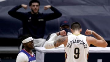 Willy Hernangomez #9 of the New Orleans Pelicans reacts with Lonzo Ball #2 . (Photo by Sean Gardner/Getty Images)