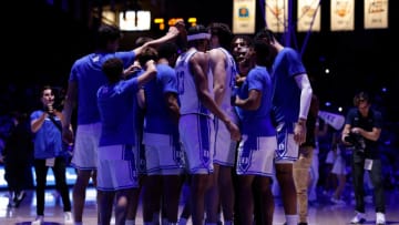 Duke basketball team huddle (Photo by Lance King/Getty Images)