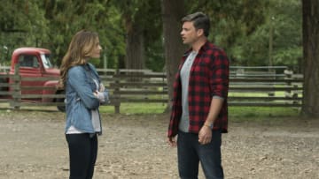 Batwoman -- "Crisis on Infinite Earths: Part Two" -- Image Number: BWN108a_0390.jpg -- Pictured (L-R): Erica Durance as Lois Lane and Tom Welling as Clark Kent -- Photo: Dean Buscher/The CW -- © 2019 The CW Network, LLC. All Rights Reserved.