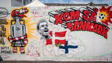 A mural with a portrait of Christian Eriksen and reads 'Come on, Denmark' (Photo by MADS CLAUS RASMUSSEN/Ritzau Scanpix/AFP via Getty Images)