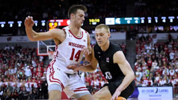 Wisconsin forward Carter Gilmore (14) guards Michigan State forward Joey Hauser (10) during the first half of their game Tuesday, January 10, 2023 at the Kohl Center in Madison, Wis.Uwmen10 12