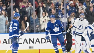 Toronto Maple Leafs center William Nylander (88) celebrates scoring a goal in overtime with center John Tavares (91) against the Tampa Bay Lightning. Nick Turchiaro-USA TODAY Sports