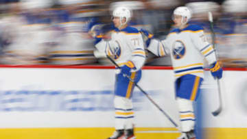 Mar 15, 2023; Washington, District of Columbia, USA; Buffalo Sabres right wing JJ Peterka (77) celebrates with teammates after scoring a goal against the Washington Capitals in the first period at Capital One Arena. Mandatory Credit: Geoff Burke-USA TODAY Sports