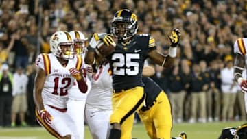 Sep 10, 2016; Iowa City, IA, USA; Iowa Hawkeyes running back Akrum Wadley (25) scores a touchdown against the Iowa State Cyclones at Kinnick Stadium. The Hawkeyes beat the Cyclones 42-3. Mandatory Credit: Reese Strickland-USA TODAY Sports