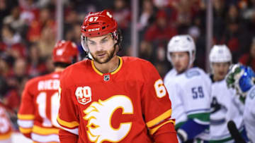 CALGARY, AB - DECEMBER 29: Calgary Flames Right Wing Michael Frolik (67) looks on after a whistle during the first period of an NHL game where the Calgary Flames hosted the Vancouver Canucks on December 29, 2019, at the Scotiabank Saddledome in Calgary, AB. (Photo by Brett Holmes/Icon Sportswire via Getty Images)